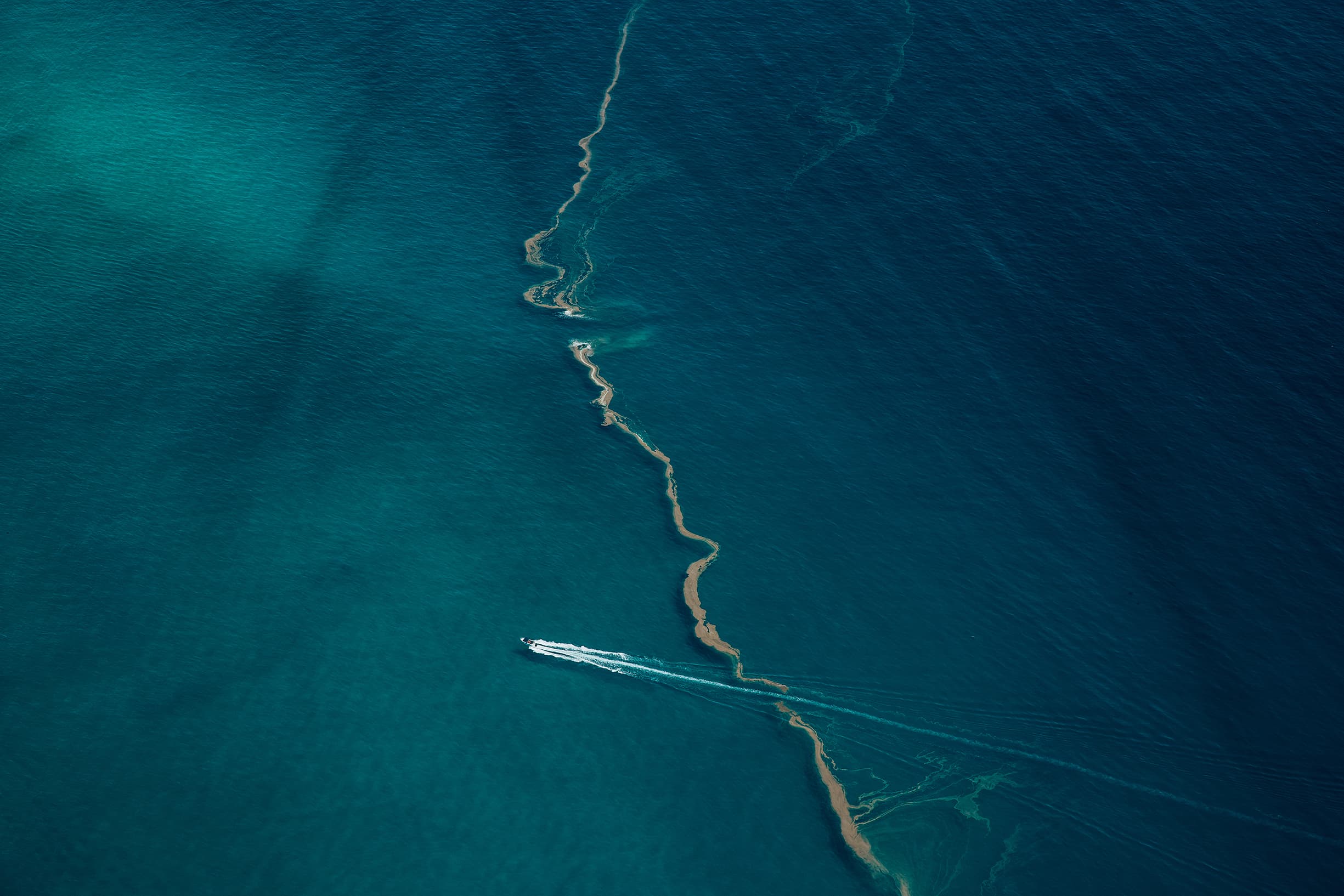 Boat cruising through Gold Coast waterways.
