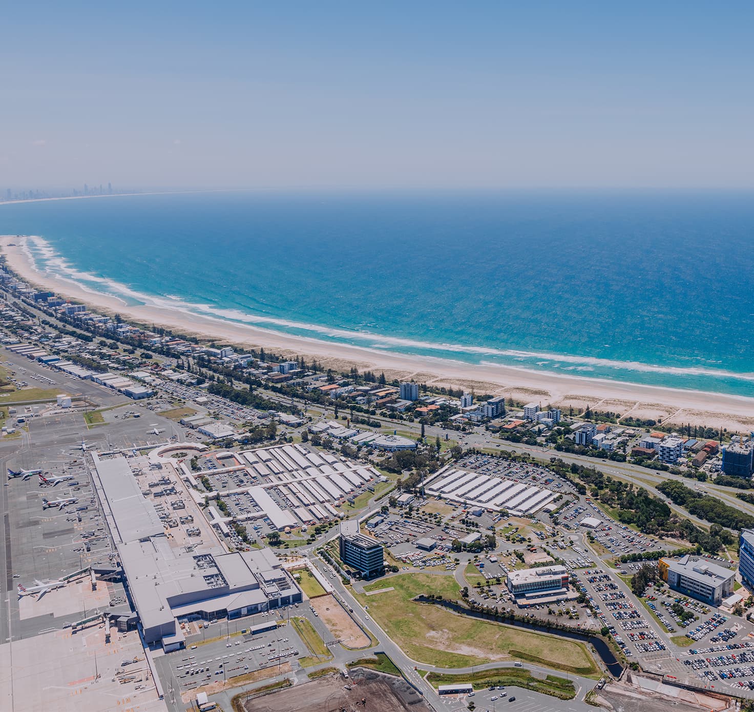 Aerial view of Gold Coast airport expansion and southern Gold Coast coastline.